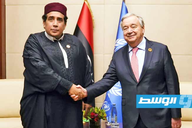 رئيس المجلس الرئاسي محمد المنفي مع الأمين العام للأمم المتحدة، على هامش قمة الاتحاد الأفريقي، 15 فبراير 2025. (المكتب الإعلامي لرئيس المجلس الرئاسي)