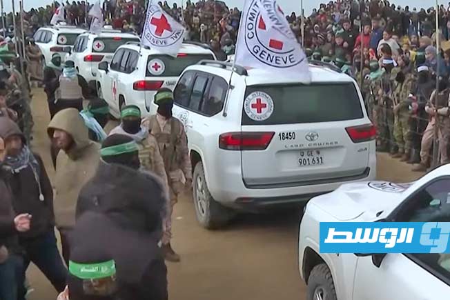 من مراسم تسليم جثامين الأسرى الإسرائيليين إلى الصليب الأحمر في خان يونس، 20 فبراير 2025. (الجزيرة)