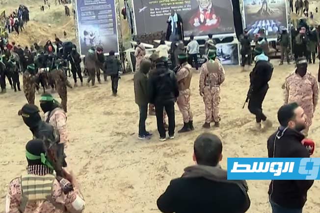 من مراسم تسليم جثامين الأسرى الإسرائيليين إلى الصليب الأحمر في خان يونس، 20 فبراير 2025. (الجزيرة)