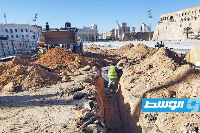 من أعمال تنفيذ خط تصريف مياه الأمطار بـ«ميدان الشهداء»، 24 يناير 2025. (شركة المياه)