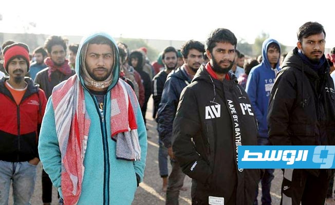من عملية تسليم عدد من المهاجرين غير الشرعيين إلى جهاز مكافحة الهجرة غير الشرعية، 8 يناير 2022. (اللواء 128 المعزز)