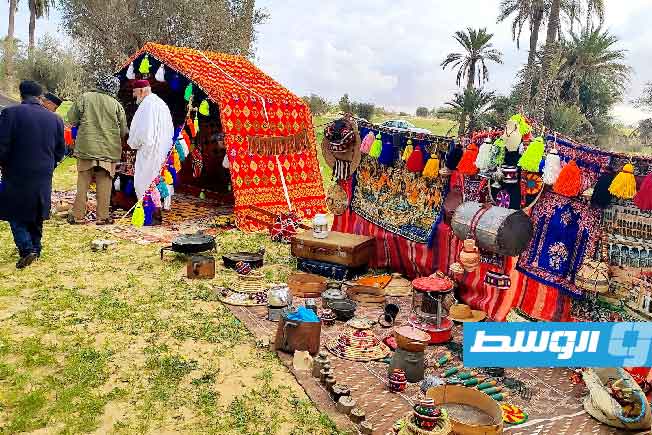 من أجواء الدورة الثانية عشرة من مهرجان واحة النخيل للتراث الشعبي في الطويلة بزلطن. (المركز الإعلامي لبلدية زلطن)