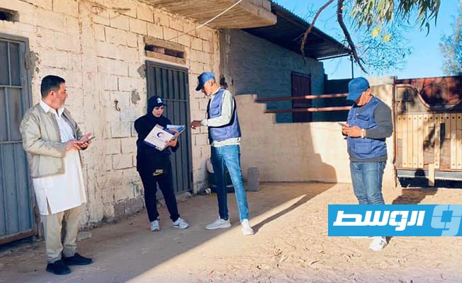 مشاركون في حملة تحصين الخيول من الأمراض (المركز الوطني للصحة الحيوانية)
