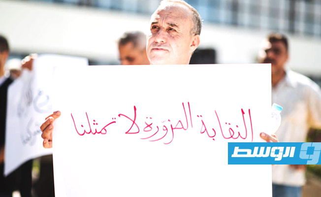 عمال في الشركة الليبية للحديد والصلب خلال وقفة احتجاجية، 14 أغسطس 2023. (الصفحة الرسمية للشركة)
