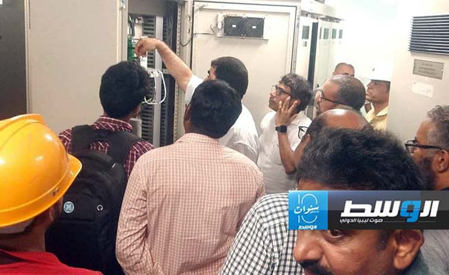 فنيون يعملون في إنجاز غلاية الوحدة الثانية بمحطة سرت البخارية (الشركة العامة للكهرباء)