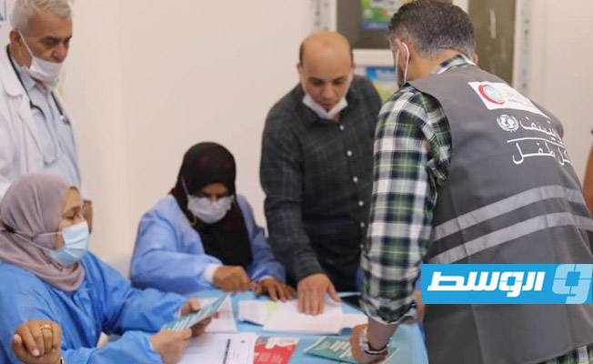 حملة للتوعية بشأن تطعيم «كورونا» في سهل الجفارة والزهراء، 6 مايو 2021. (مركز مكافحة الأمراض)