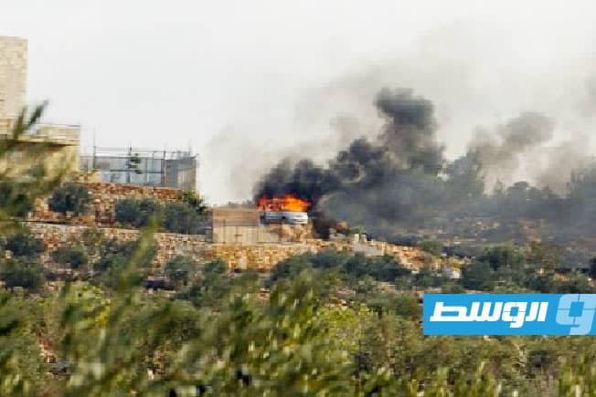 دخان متصاعد جراء استهداف المستوطنين لأشجار الزيتون في الضفة الغربية. (أرشيفية: الإنترنت)